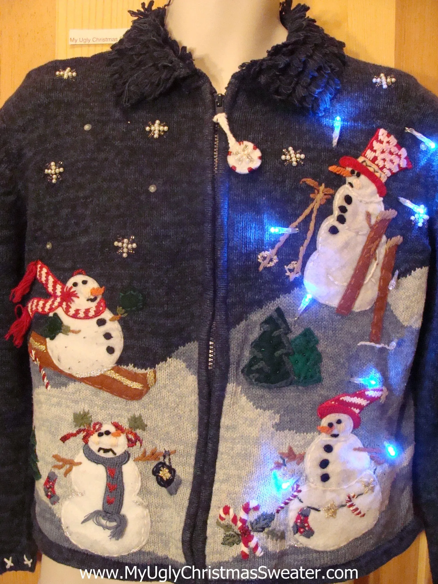 Need to Buy Christmas Sweaters? Skiing Snowmen Light Up Sweater